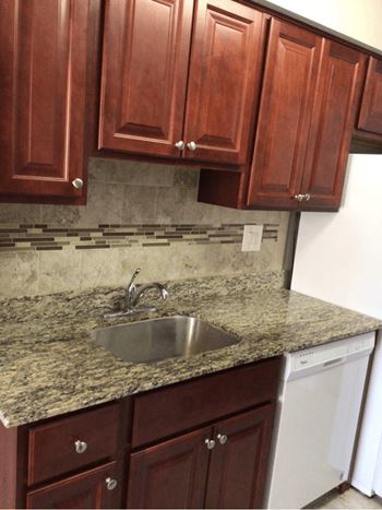 Kitchen with cherry cabinets
